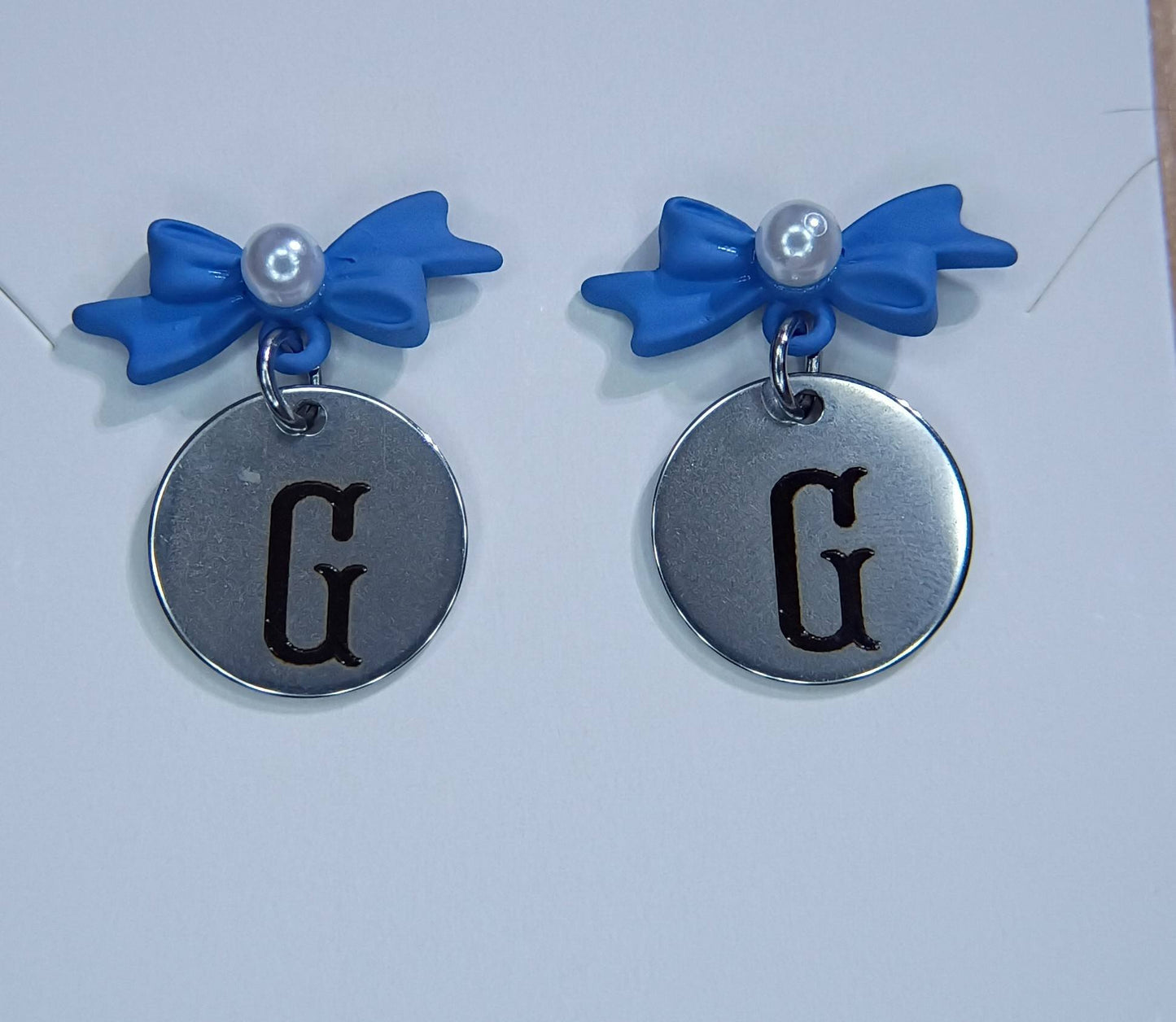 Blue with imitation pearl (Letter G) bow stud earrings