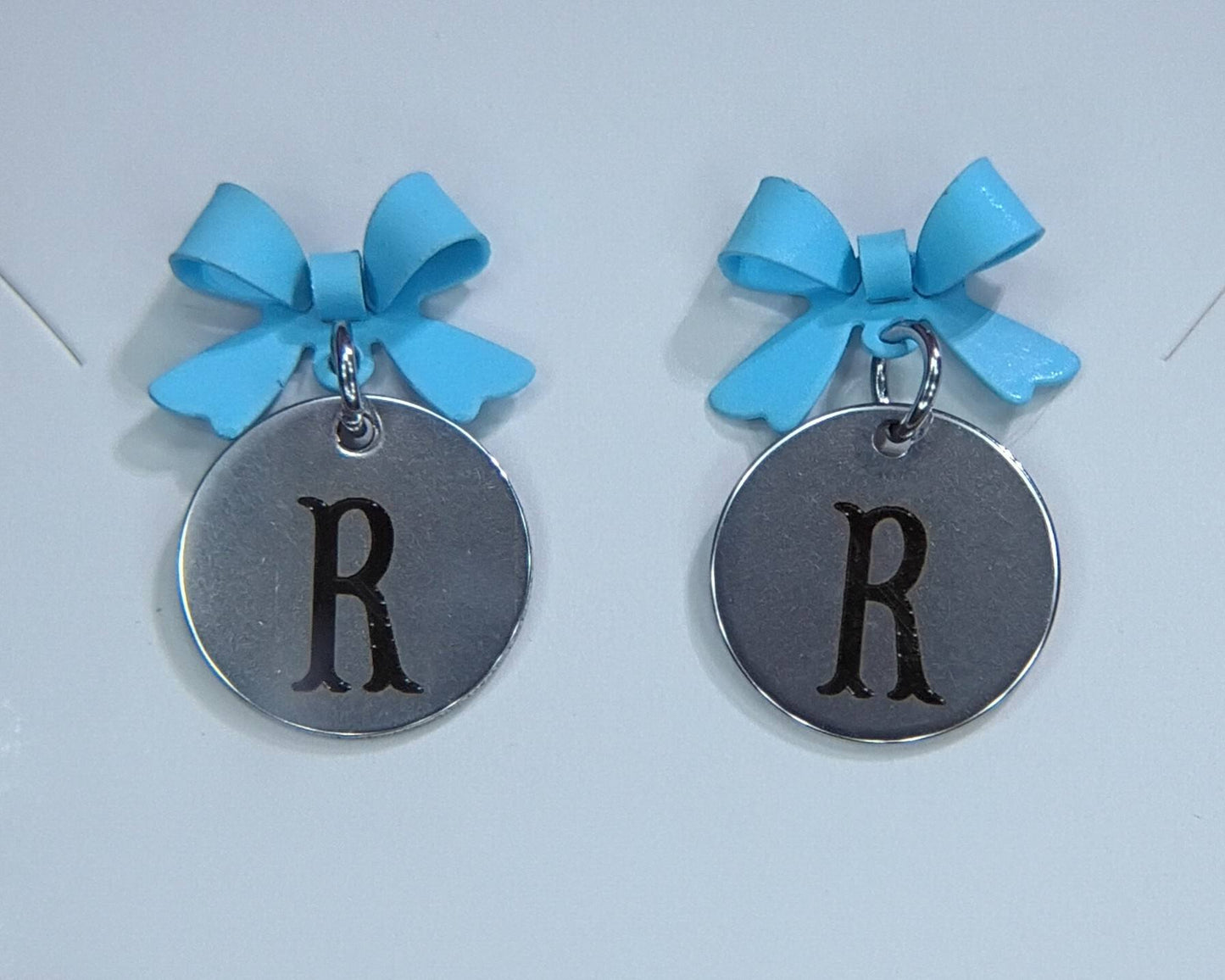 Light Blue (Letter R) bow stud earrings