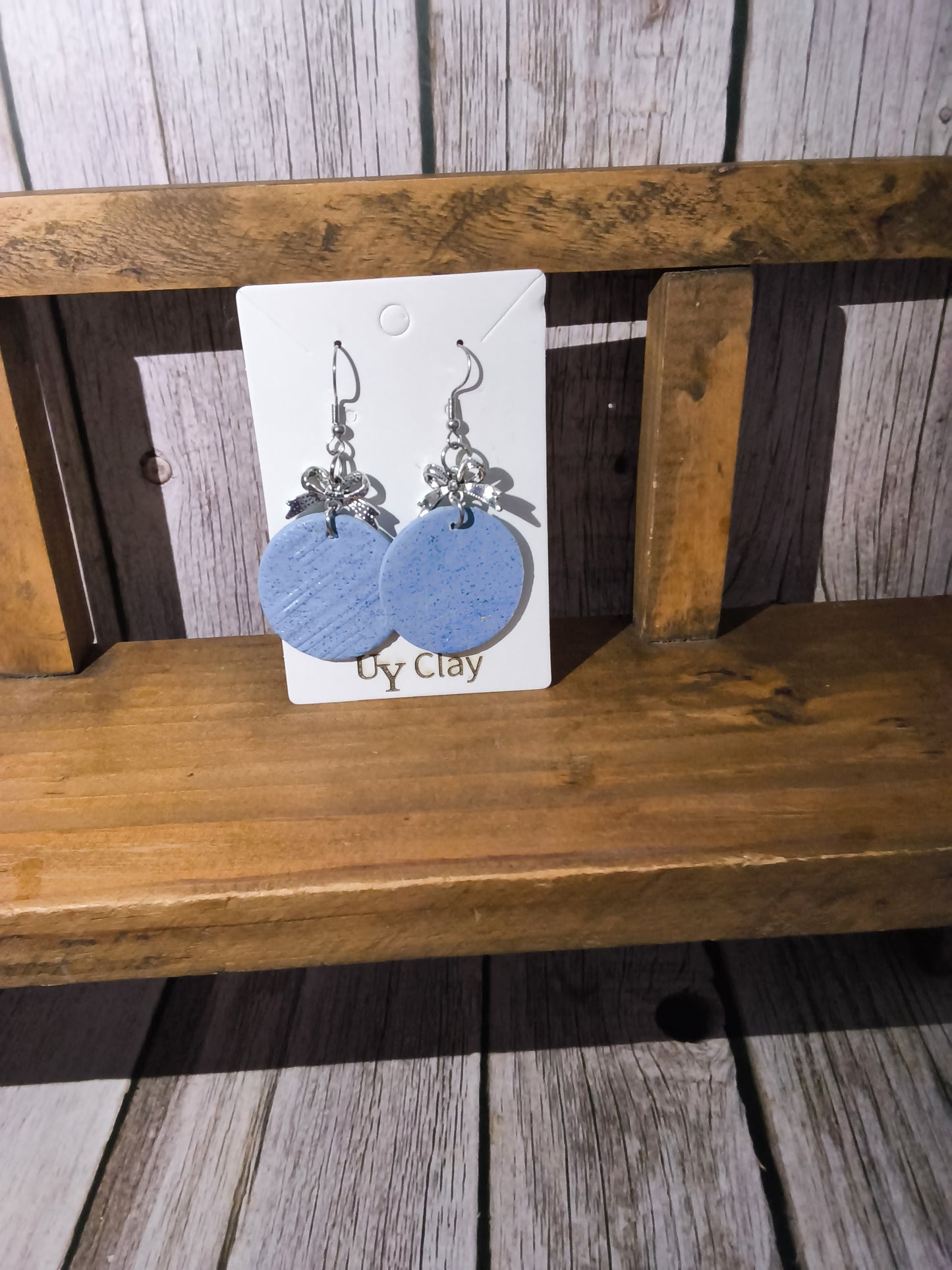Periwinkle Speckled Disc Earrings with Silver Bow Accents