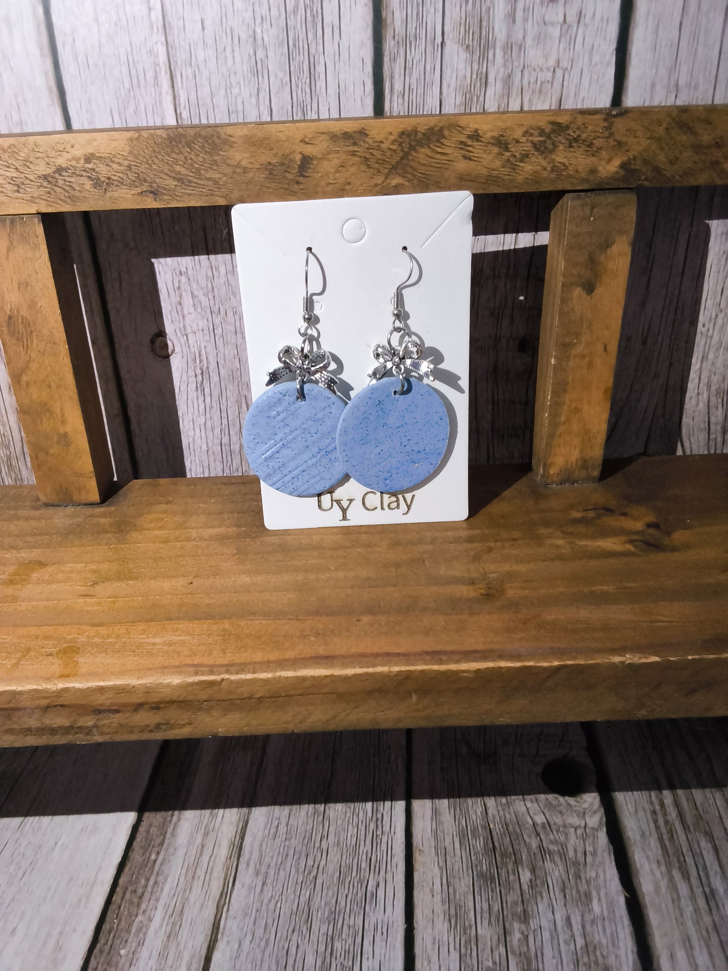 Periwinkle Speckled Disc Earrings with Silver Bow Accents