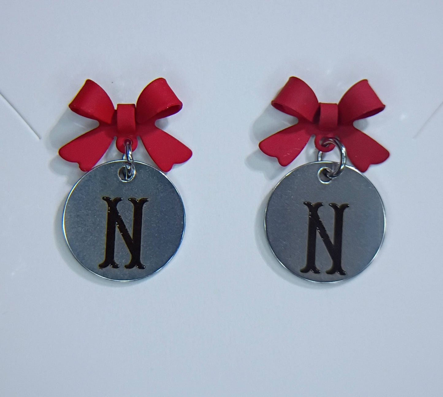 Red (Letter N) bow stud earrings